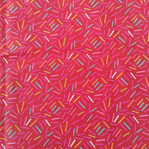 tissu coton fond rouge petit motif coloré